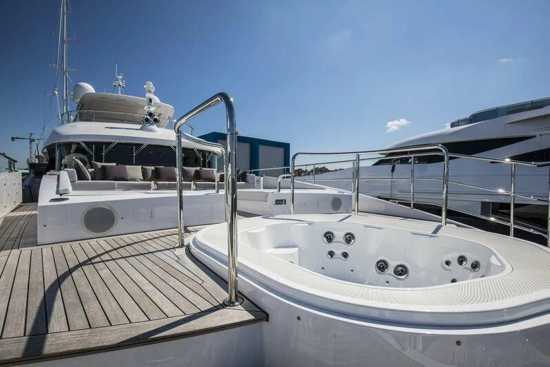 a boat docked at a pier aboard ASIA POSEIDON Yacht for Sale