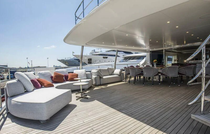 a deck with a large boat aboard ASIA POSEIDON Yacht for Sale