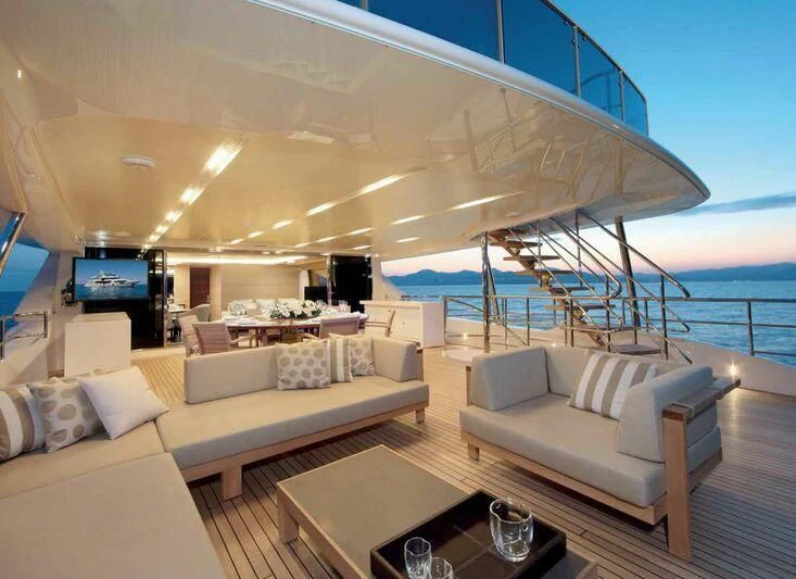 a living room with a large balcony aboard ASIA POSEIDON Yacht for Sale