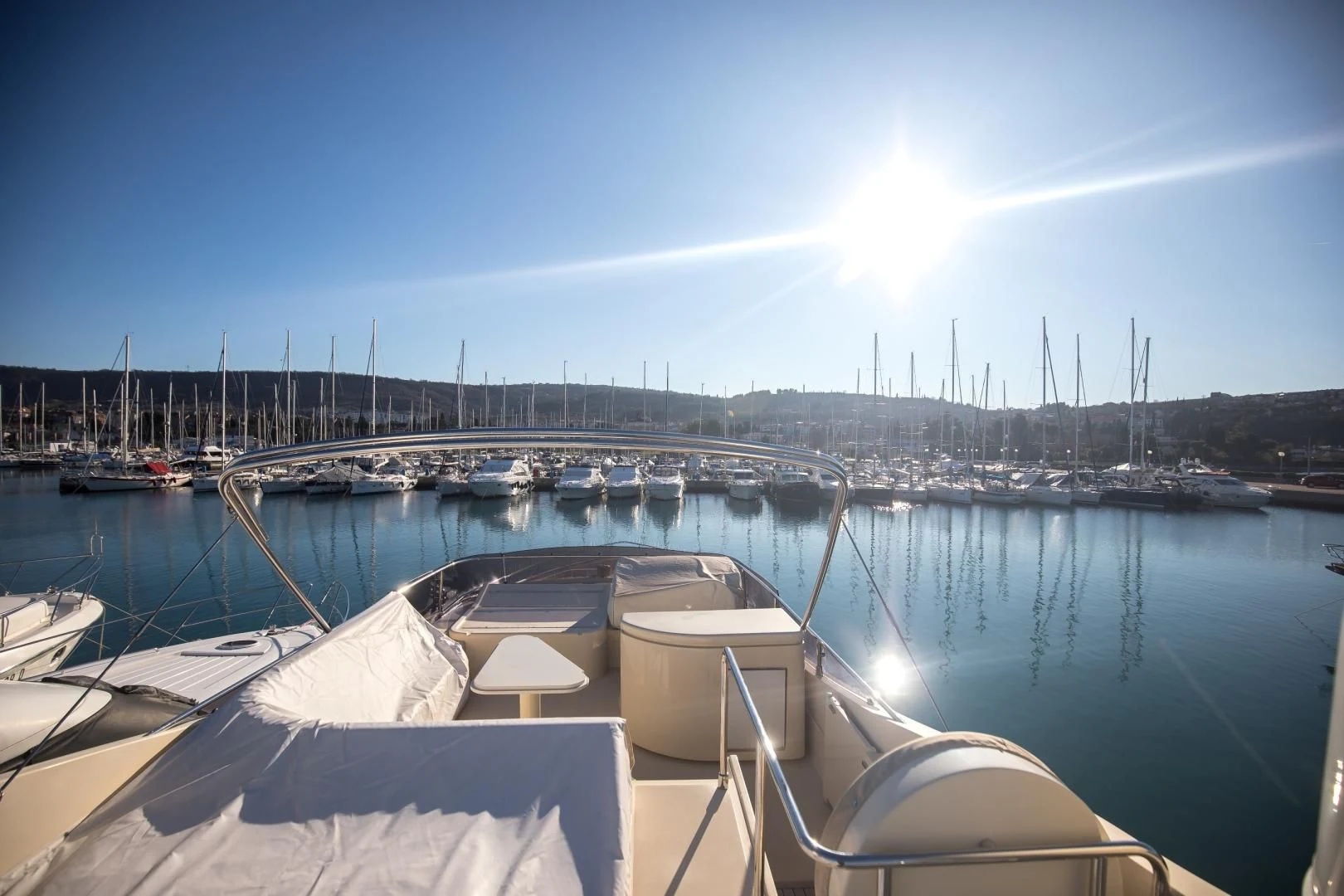 a boat in a harbor aboard TESA Yacht for Sale