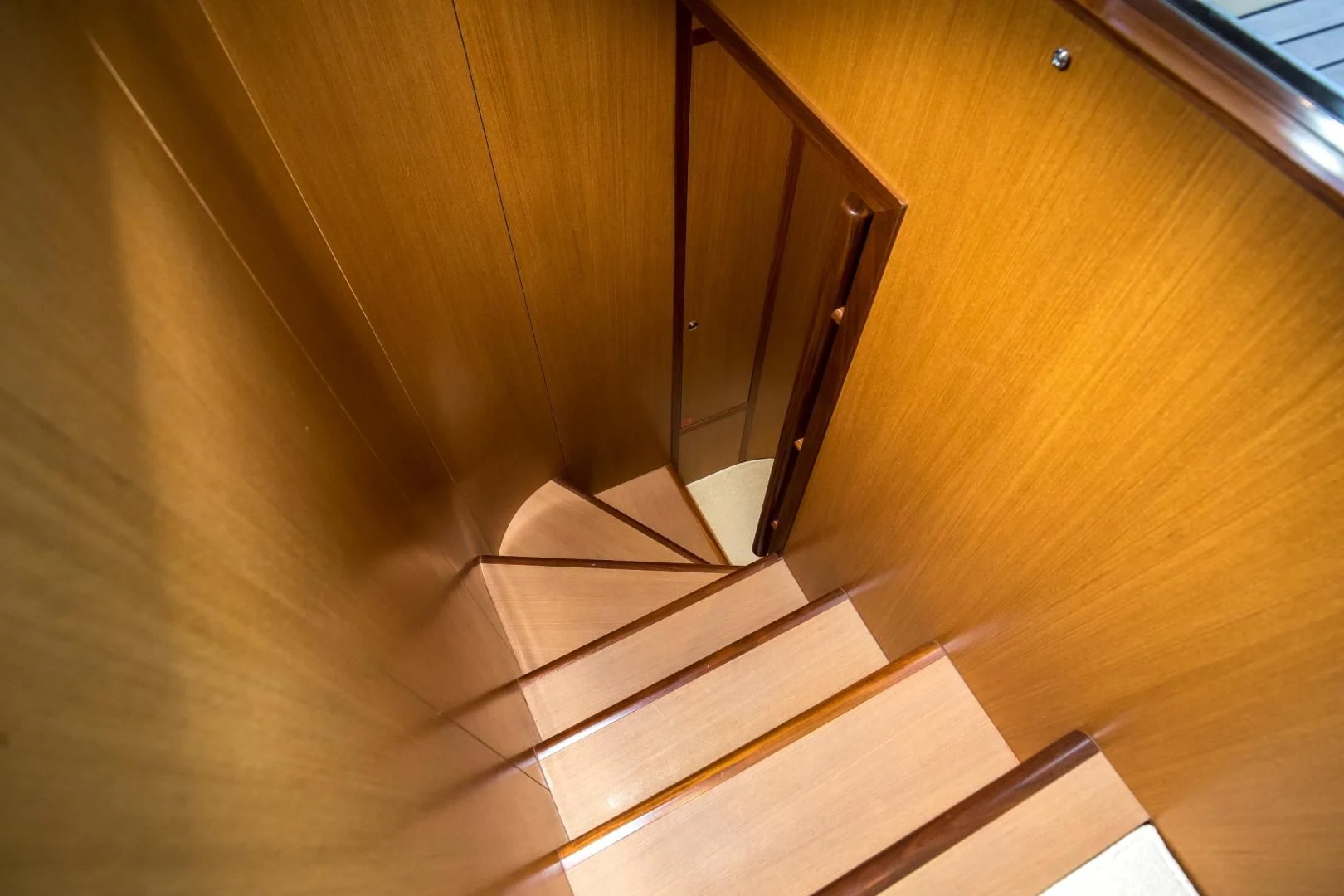 a white box on a wooden floor aboard TESA Yacht for Sale