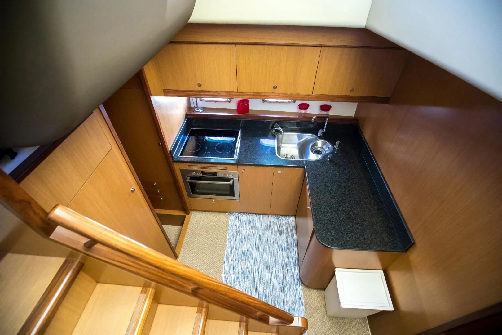 a kitchen with a sink and a stove aboard TESA Yacht for Sale