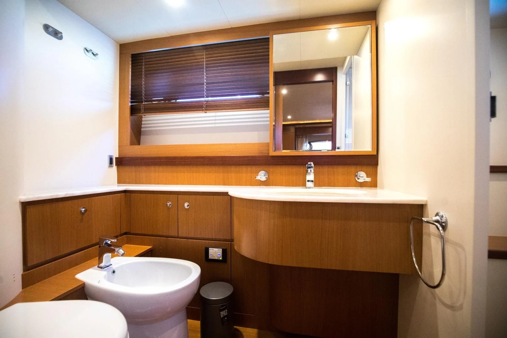 a bathroom with a sink and a mirror aboard TESA Yacht for Sale