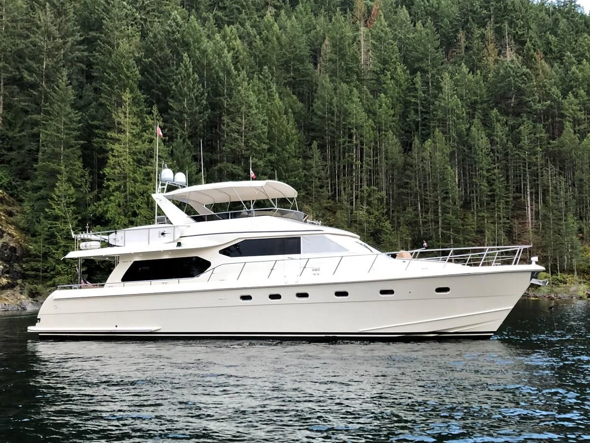 a white yacht in the water aboard MIA AND MAUI JIM Yacht for Sale