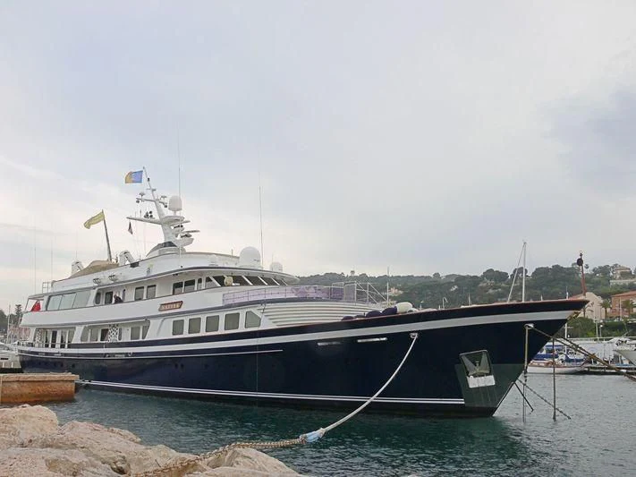 a large white boat in the water aboard NAFISA Yacht for Sale