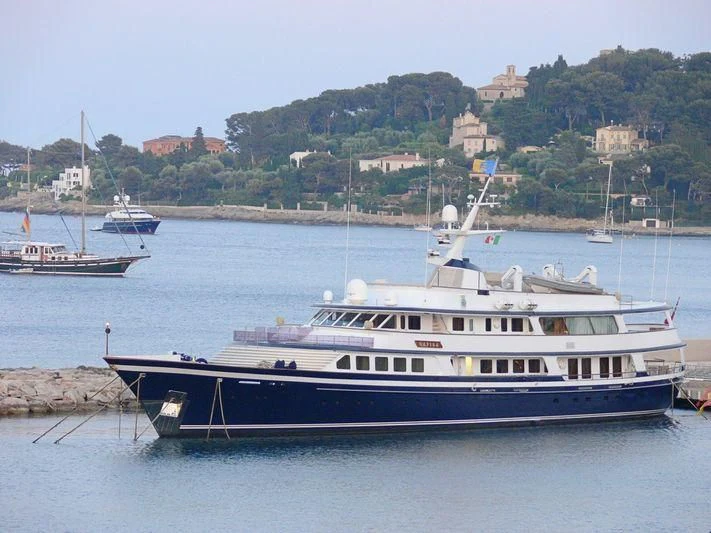 a large boat in the water aboard NAFISA Yacht for Sale