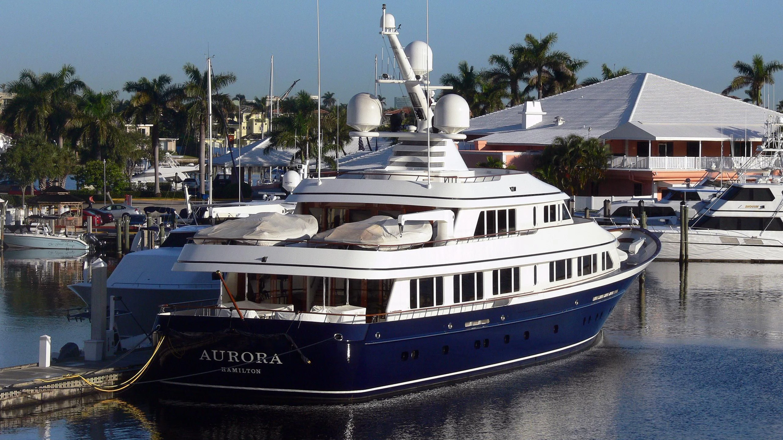 a boat docked at a pier aboard AURORA Yacht for Sale