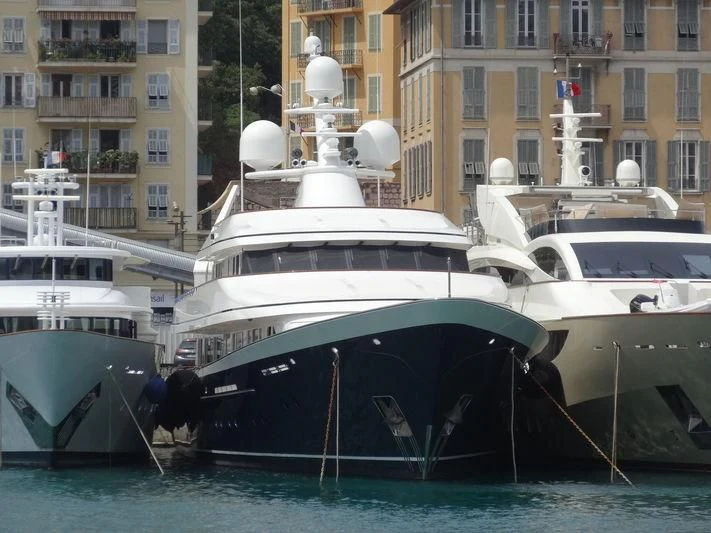 a group of boats are parked in the water aboard AURORA Yacht for Sale