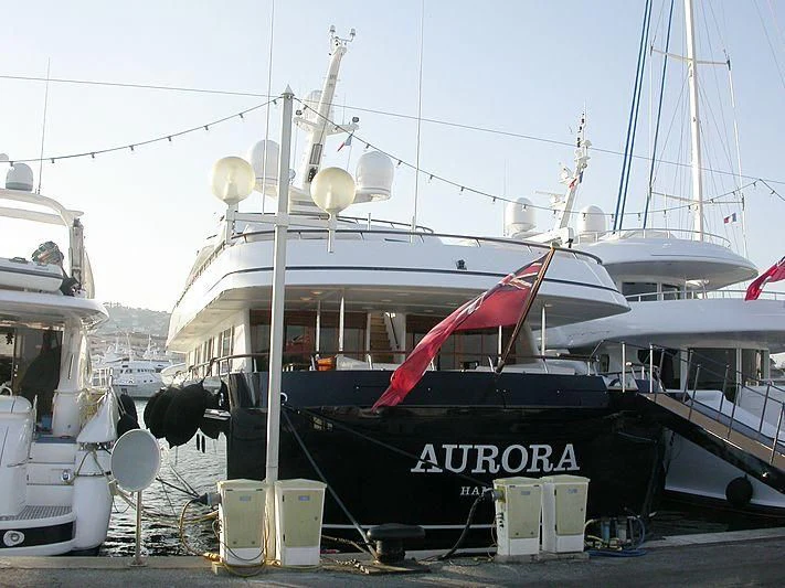 a boat docked at a pier aboard AURORA Yacht for Sale