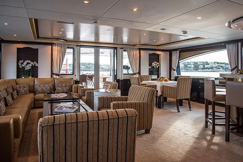 a living room with a large window aboard DIANE Yacht for Charter