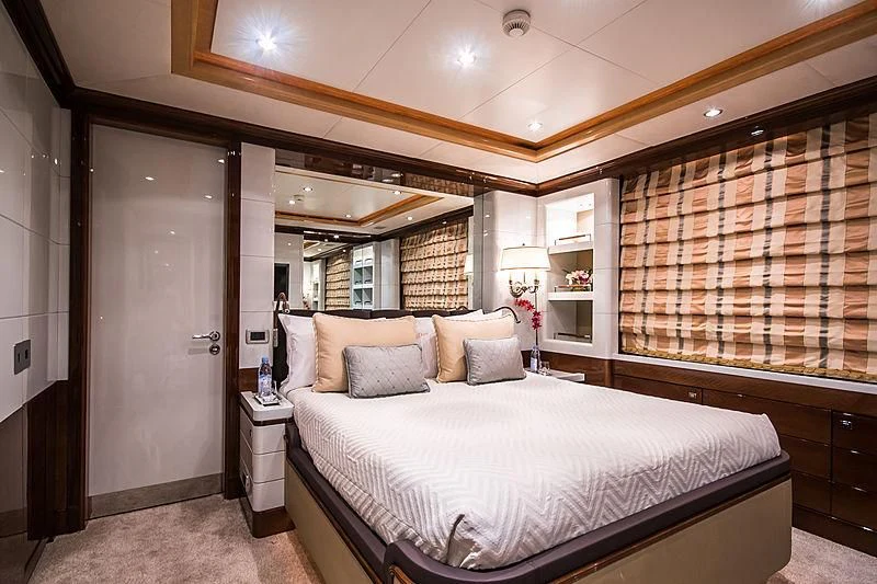 a hotel room with a bed aboard DIANE Yacht for Charter