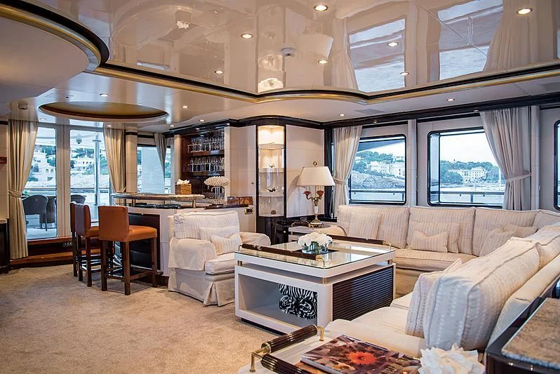 a living room with a large window aboard DIANE Yacht for Charter