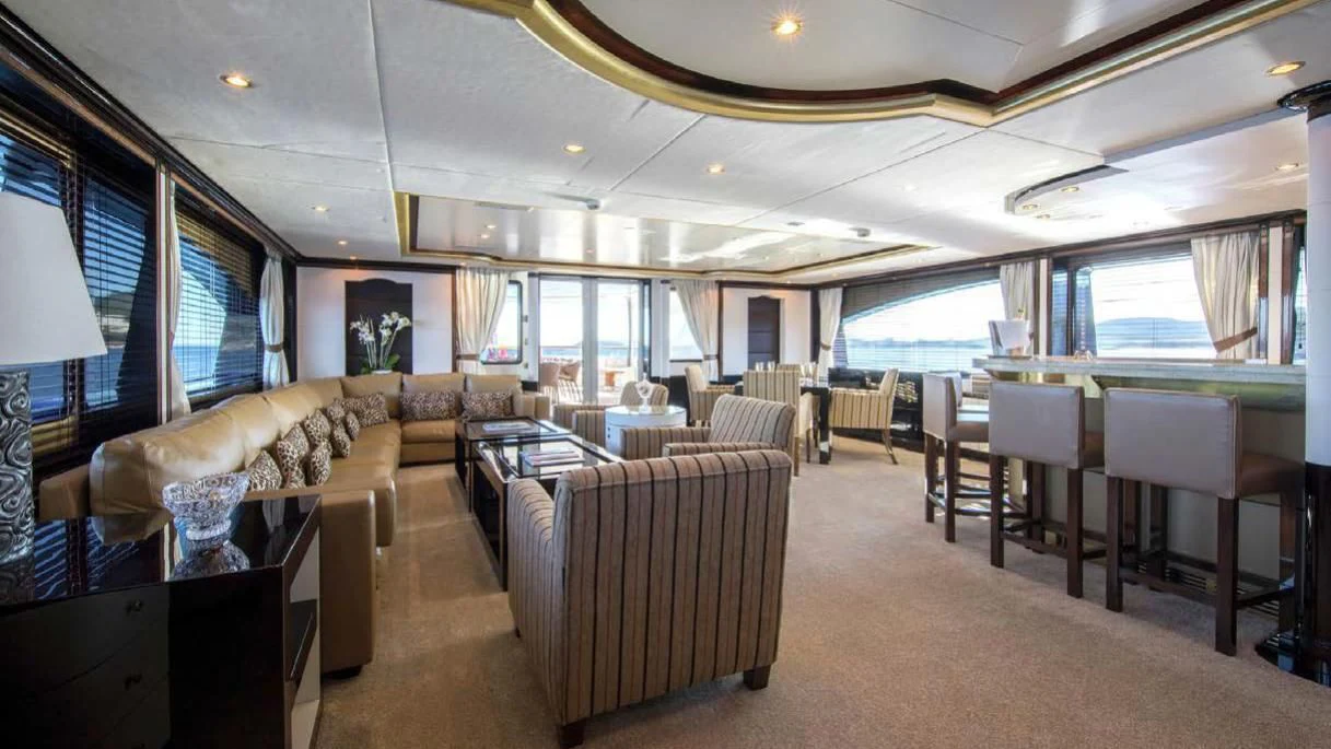 a living room with a couch and a table aboard DIANE Yacht for Charter