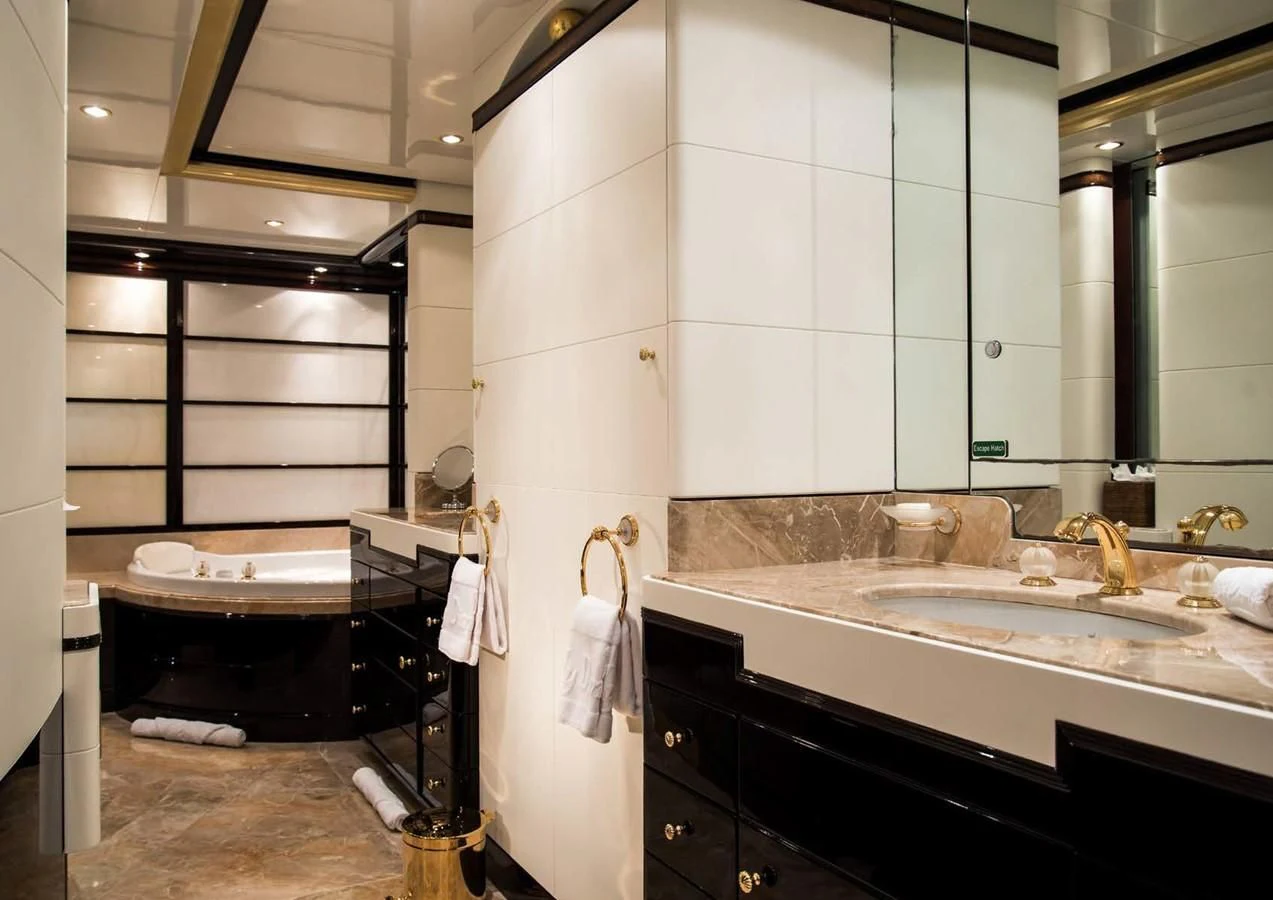 a bathroom with a sink and a mirror aboard DIANE Yacht for Charter