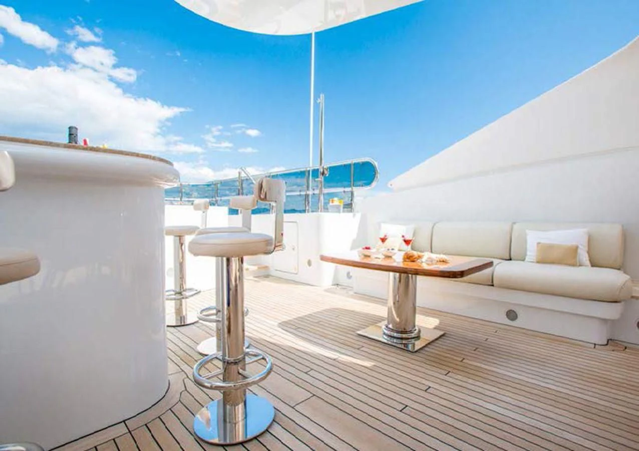 a room with a table and chairs aboard DIANE Yacht for Charter