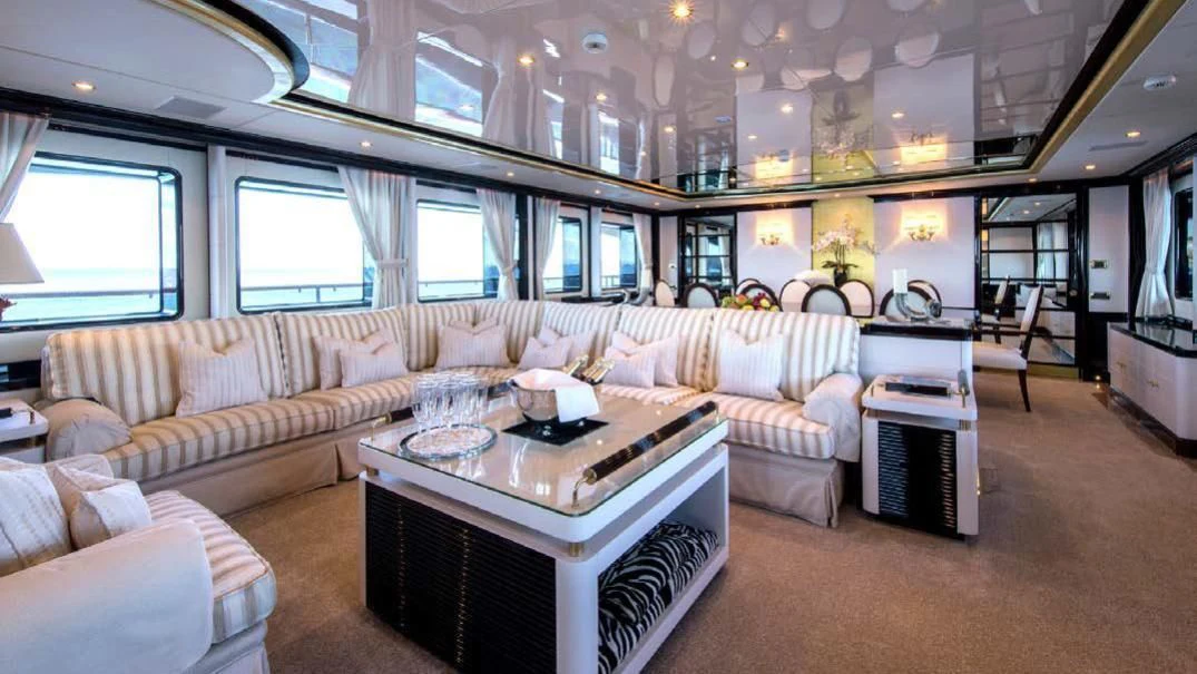 a living room with a couch and a table aboard DIANE Yacht for Charter