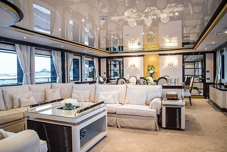 a living room with a large window aboard DIANE Yacht for Charter