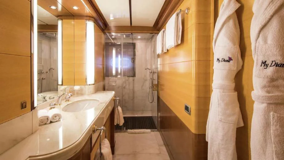 a bathroom with a sink and a mirror aboard DIANE Yacht for Charter