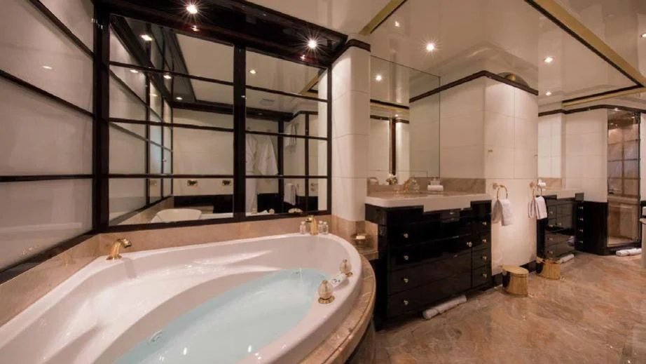 a large bathroom with a large bathtub aboard DIANE Yacht for Charter