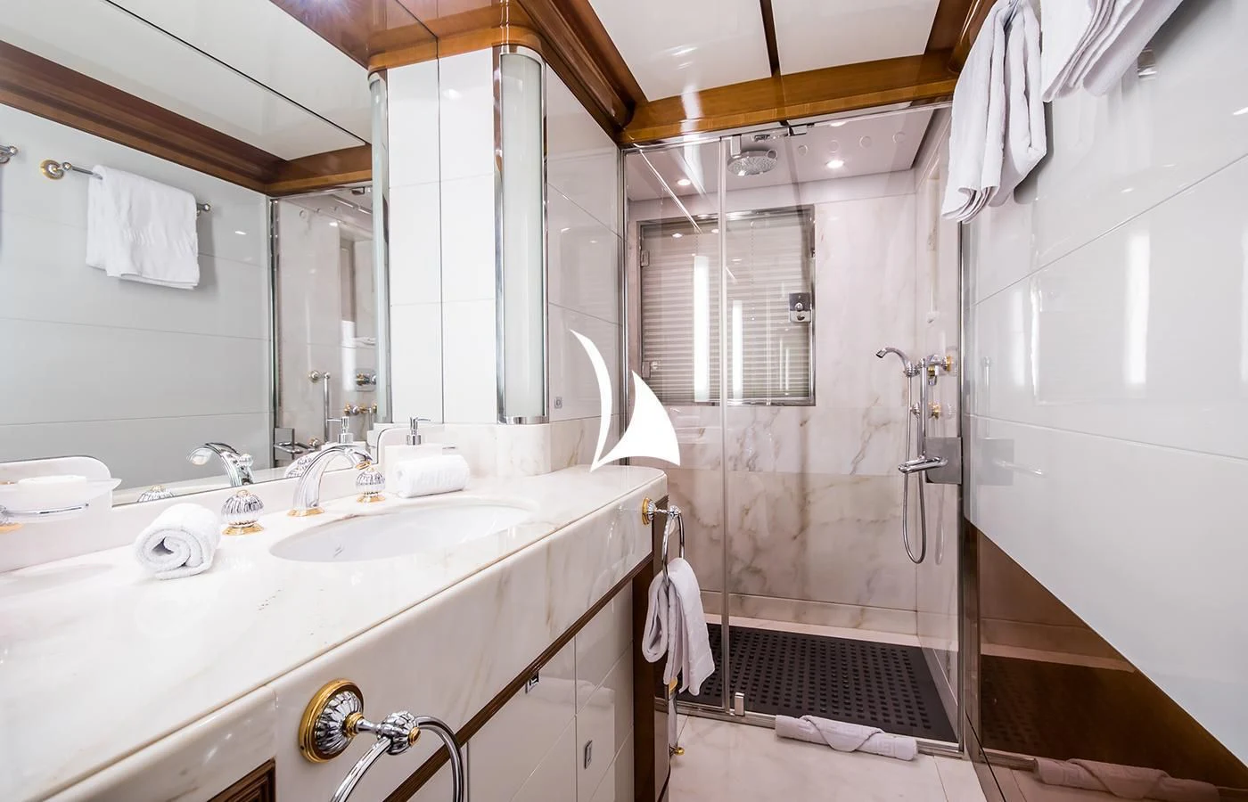 a bathroom with a sink and a shower aboard DIANE Yacht for Charter