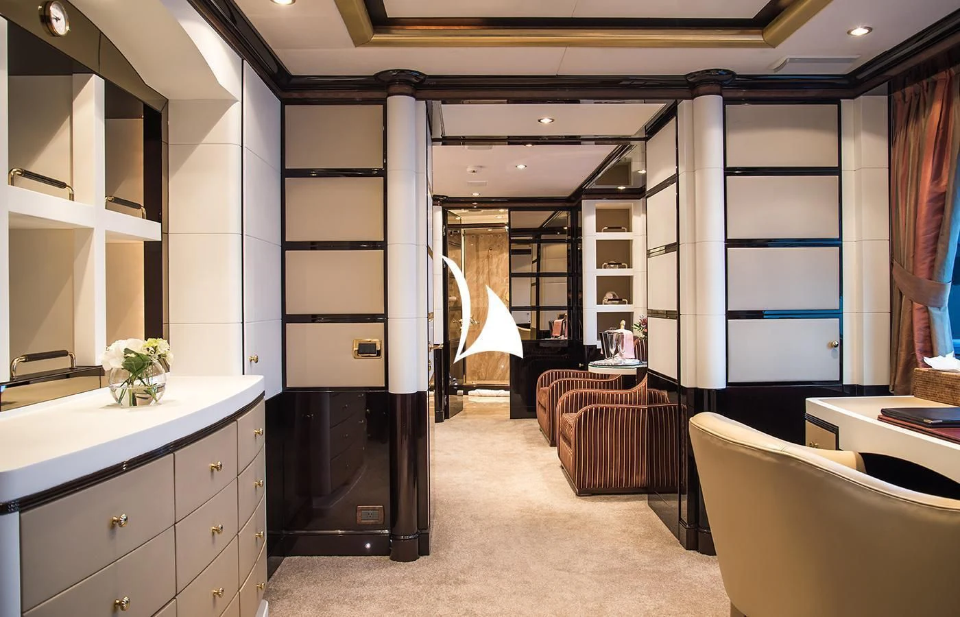 a room with a bed and a desk aboard DIANE Yacht for Charter