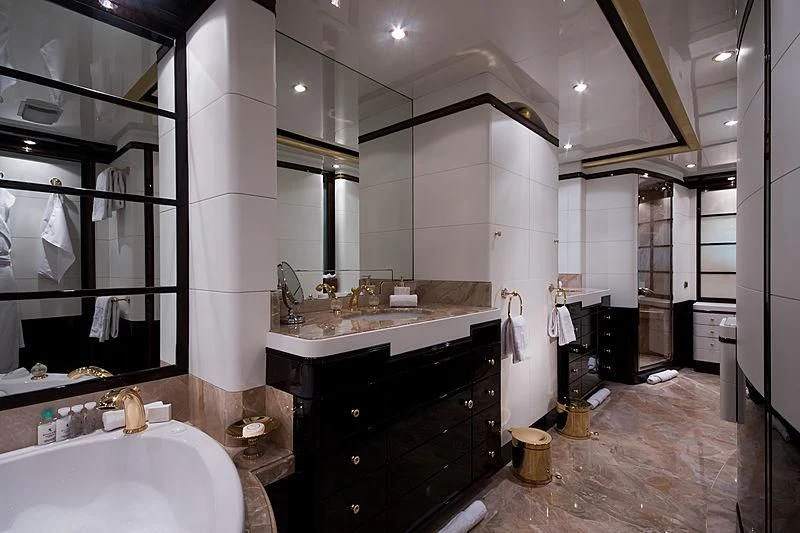 a bathroom with a large mirror aboard DIANE Yacht for Charter