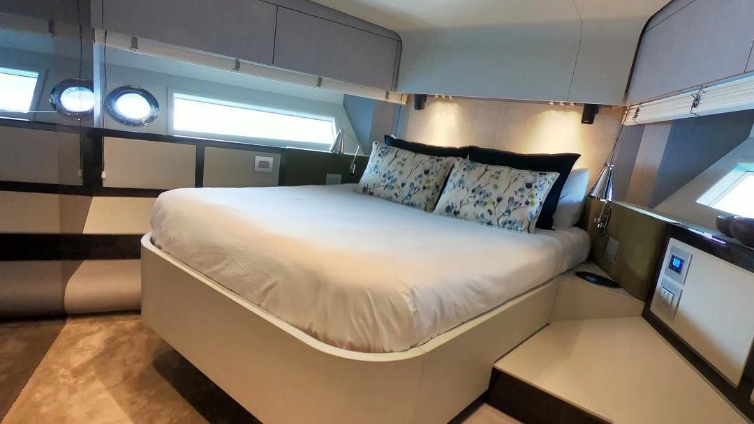 a bed in a room aboard SOARING Yacht for Sale