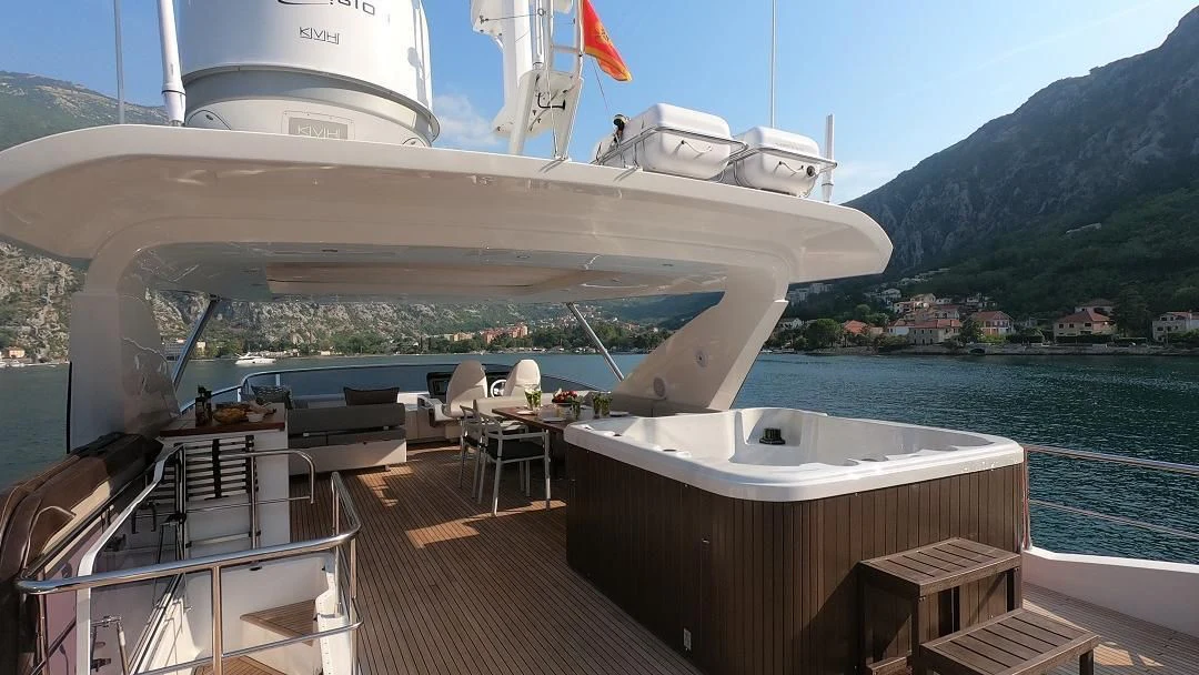 a large cruise ship docked aboard SOARING Yacht for Sale