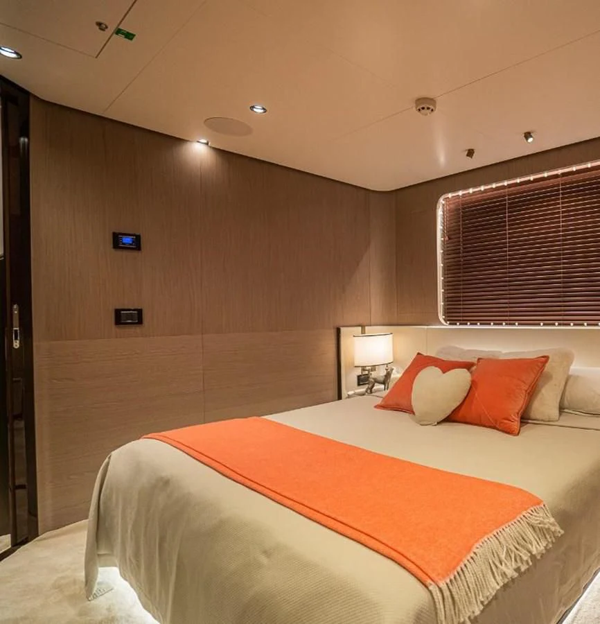 a bed in a room aboard LULWA Yacht for Sale