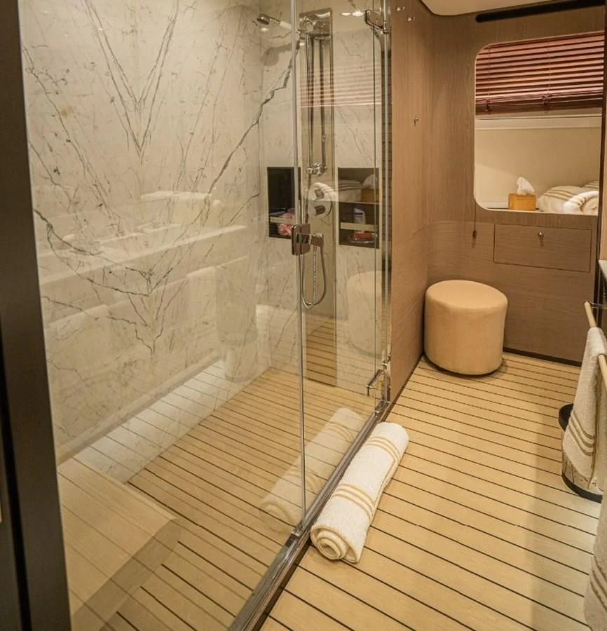 a shower with a glass door aboard LULWA Yacht for Sale