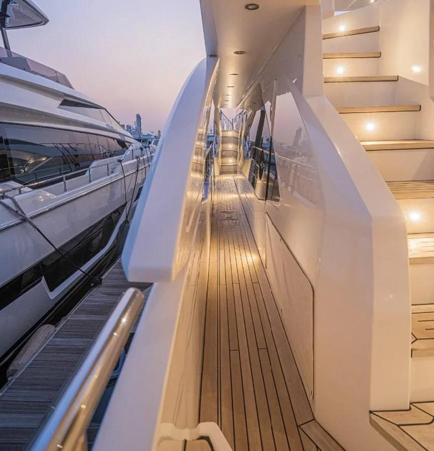 a long hallway with escalators aboard LULWA Yacht for Sale