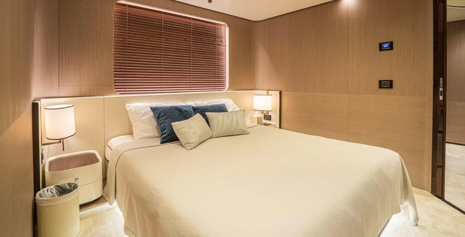 a bed with pillows and pillows aboard LULWA Yacht for Sale
