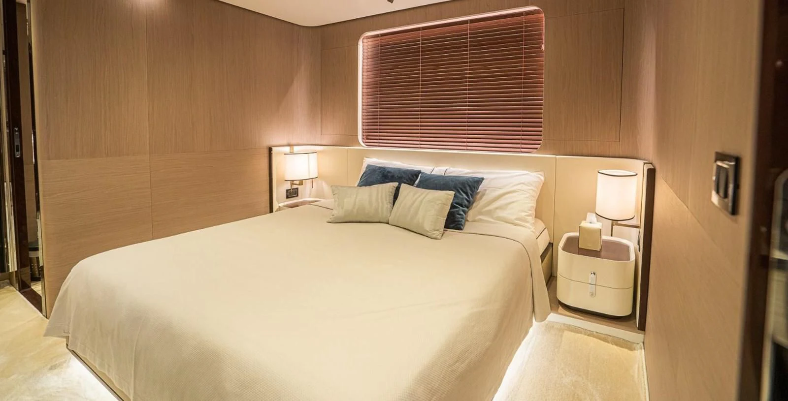 a bed in a room aboard LULWA Yacht for Sale