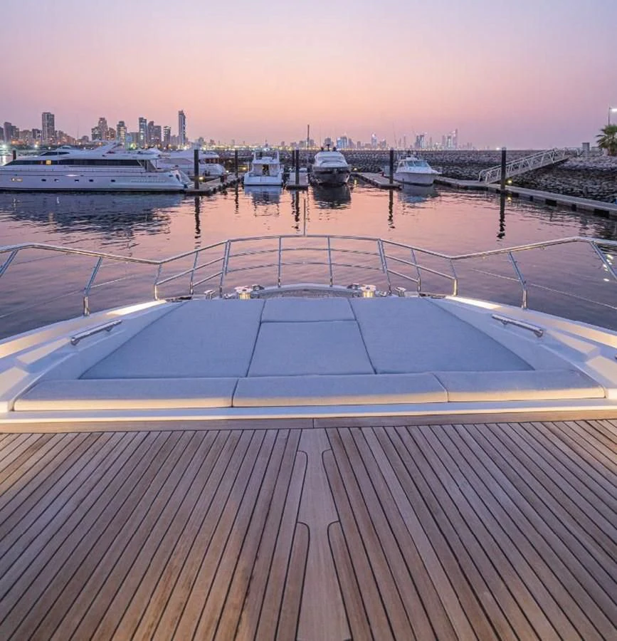 a pool with a city in the background aboard LULWA Yacht for Sale