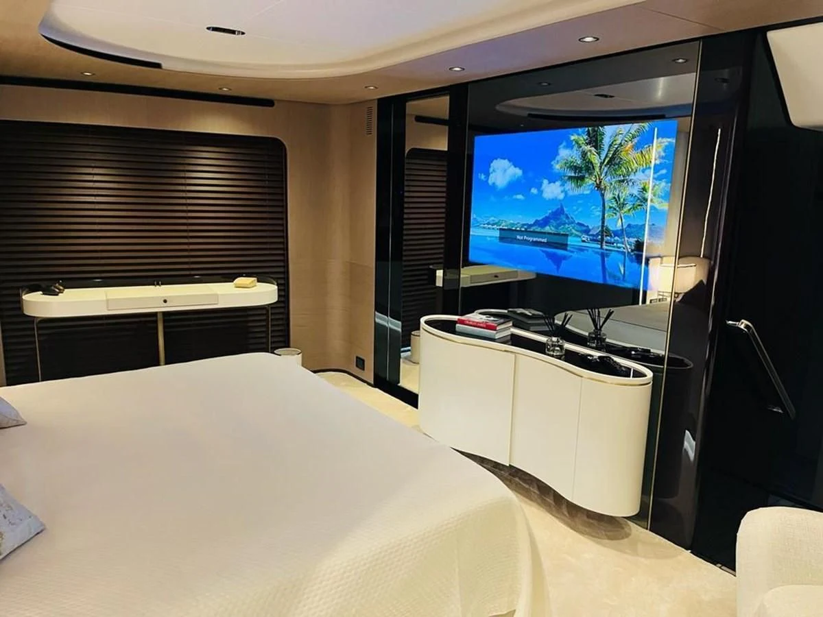 a tv on a wall aboard LULWA Yacht for Sale