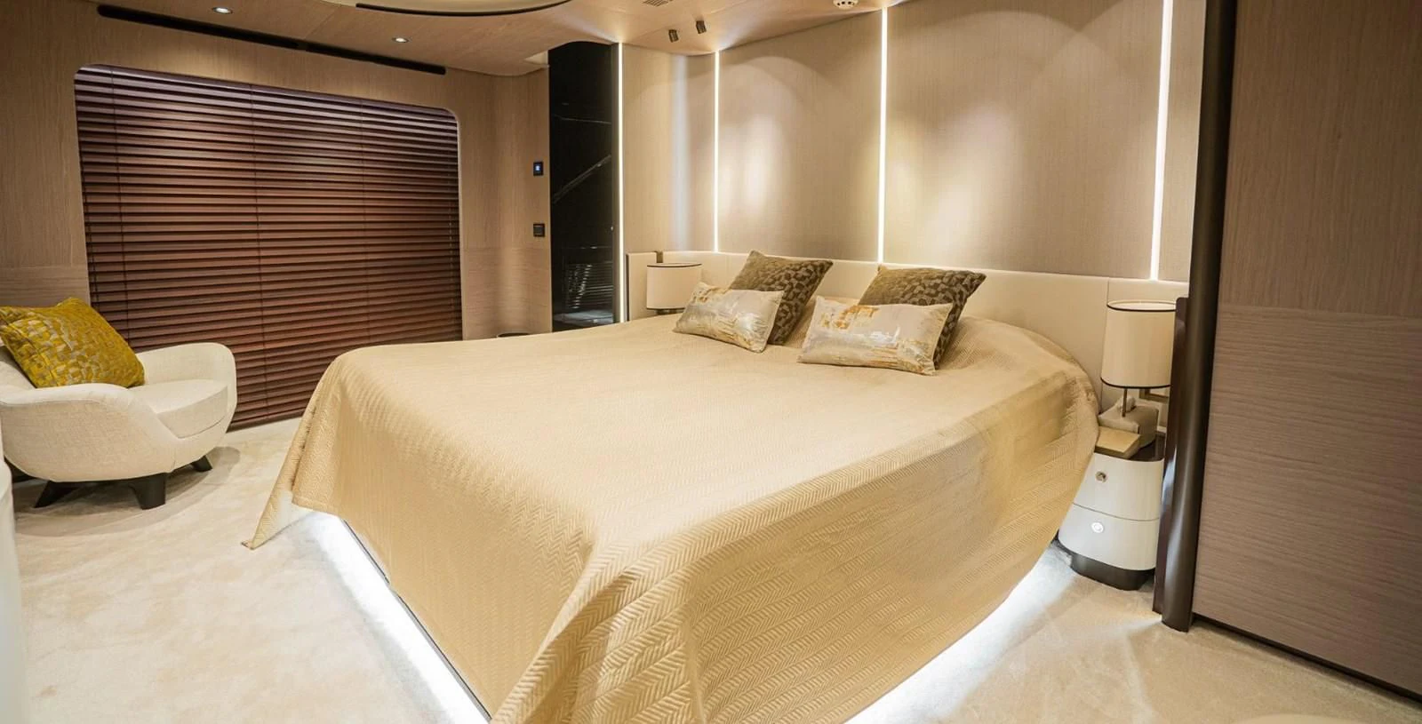 a hotel room with a bed aboard LULWA Yacht for Sale