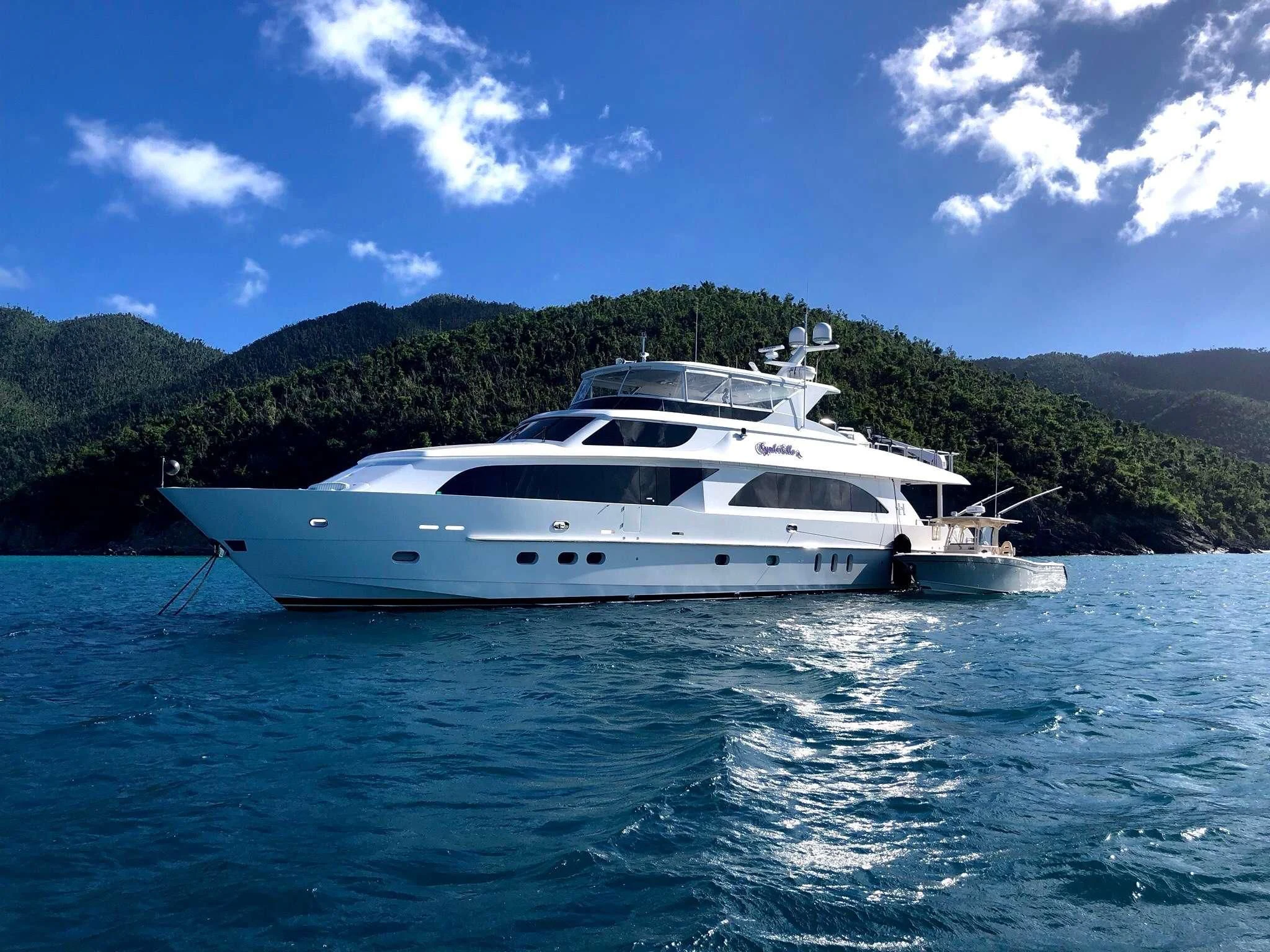 a white yacht in the water aboard CYNDERELLA Yacht for Sale