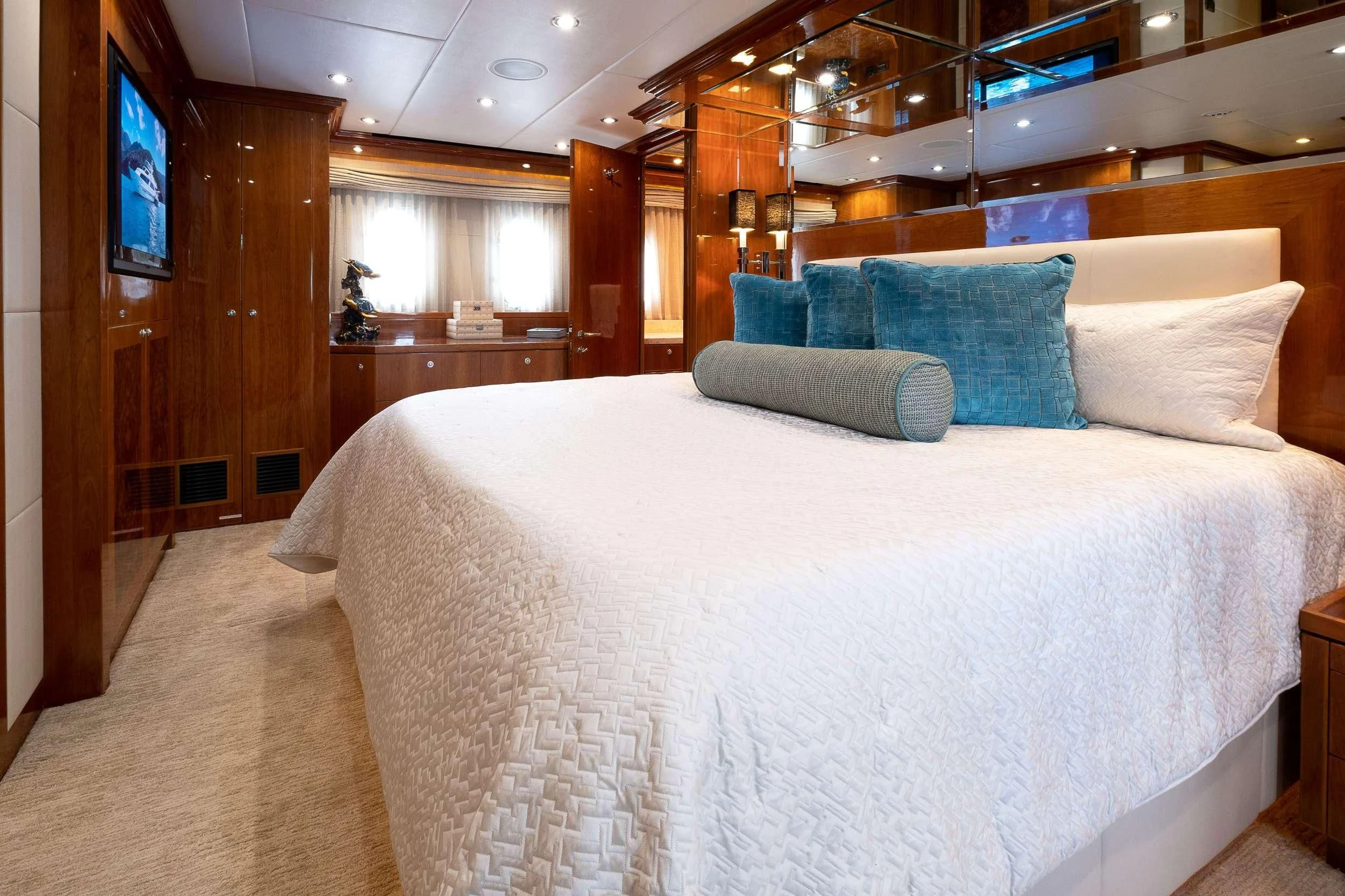 a bed in a room aboard CYNDERELLA Yacht for Sale