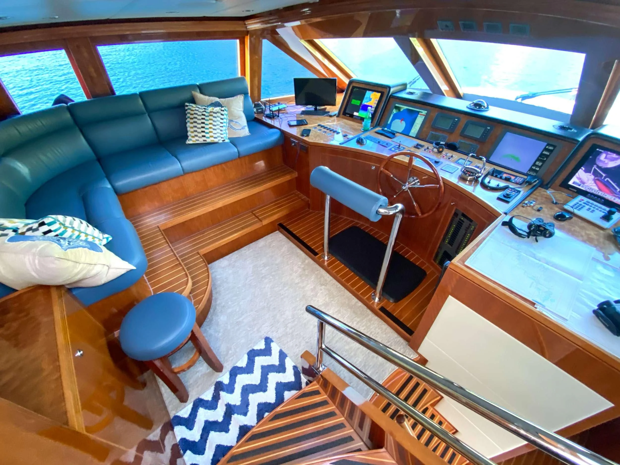 a living room with a couch and a television aboard CYNDERELLA Yacht for Sale