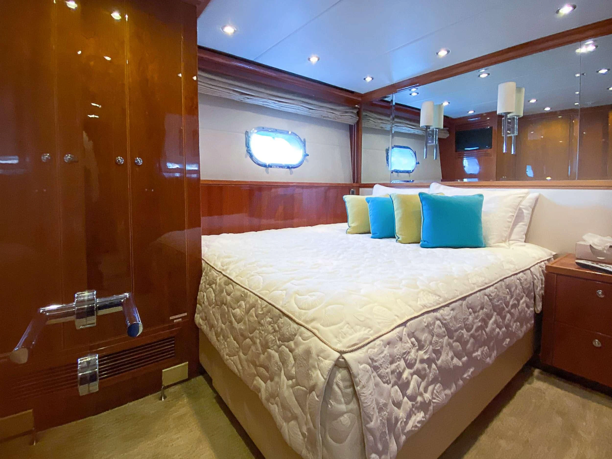 a bed in a room aboard CYNDERELLA Yacht for Sale