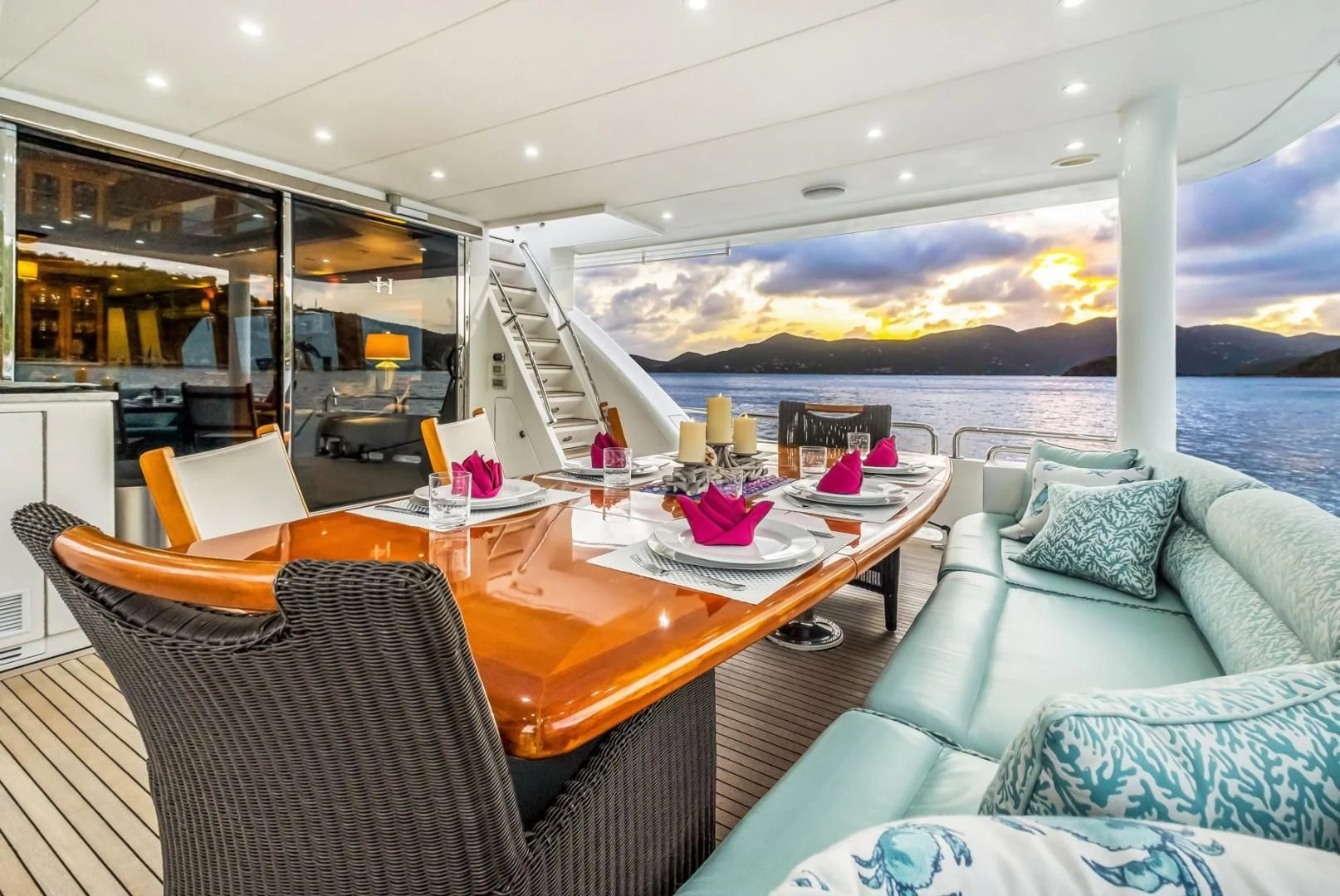 a boat with a table and chairs aboard CYNDERELLA Yacht for Sale
