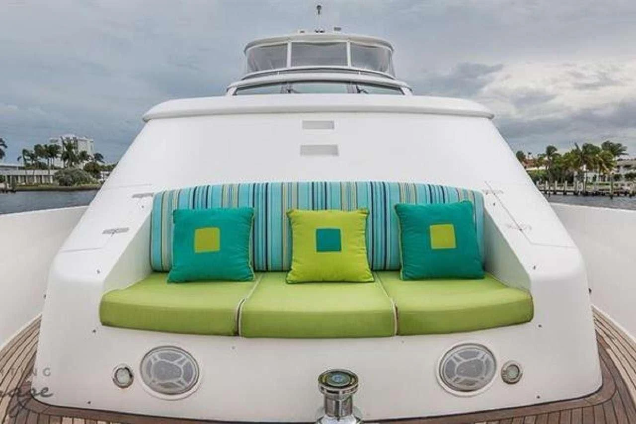 a white boat with green seats aboard CYNDERELLA Yacht for Sale