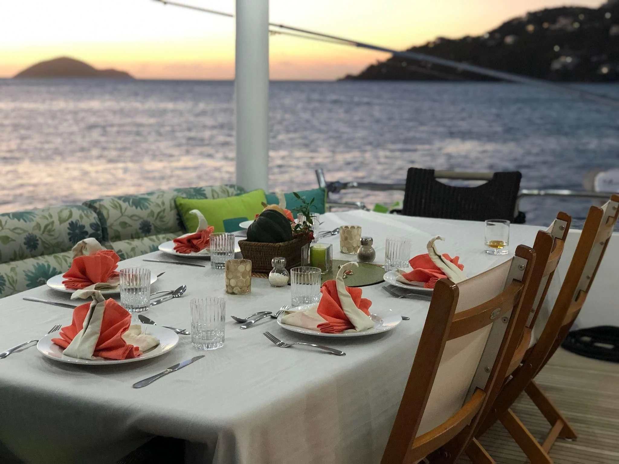 a table set with plates and food aboard CYNDERELLA Yacht for Sale