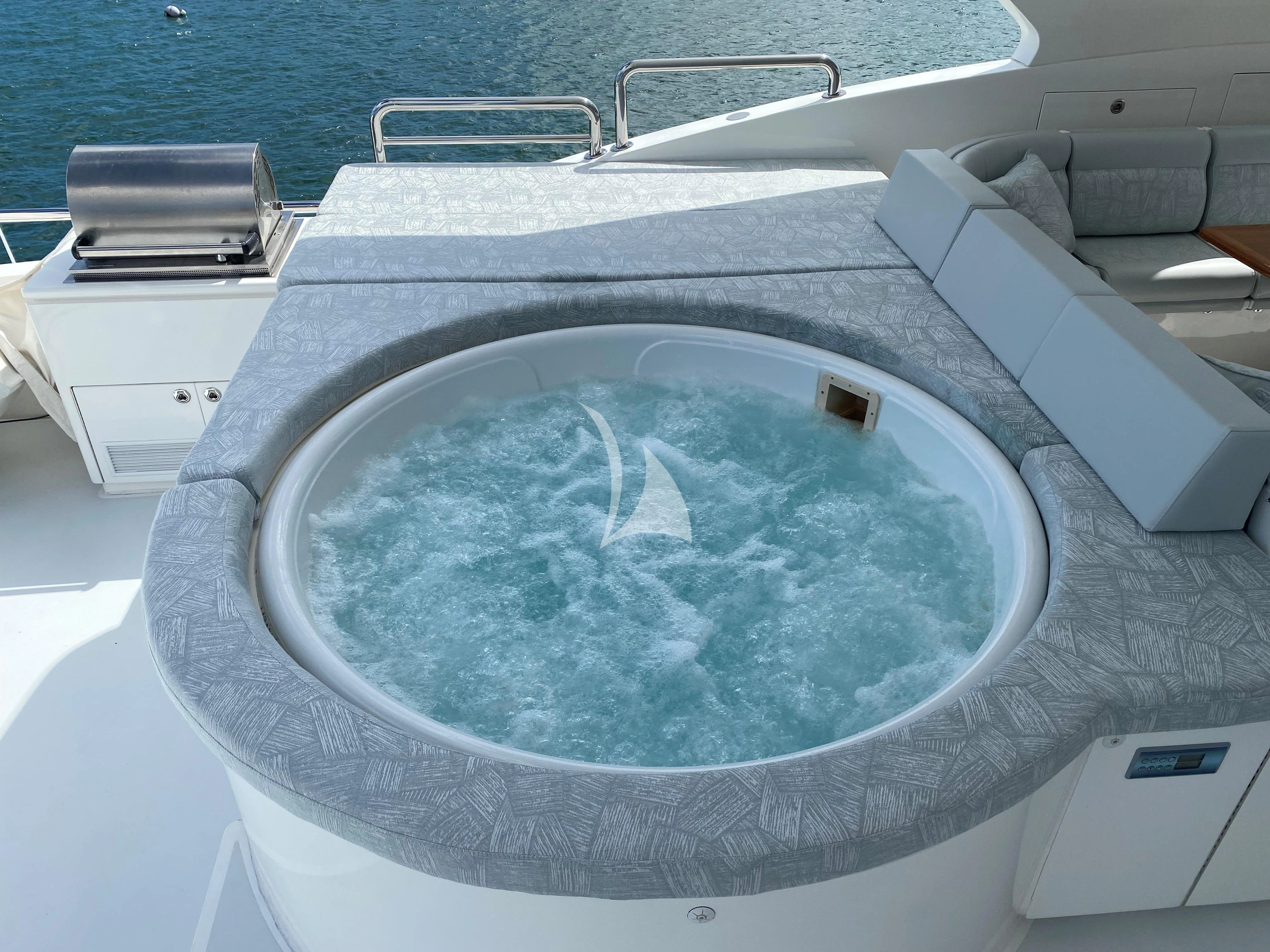 a glass bowl on a table aboard CYNDERELLA Yacht for Sale