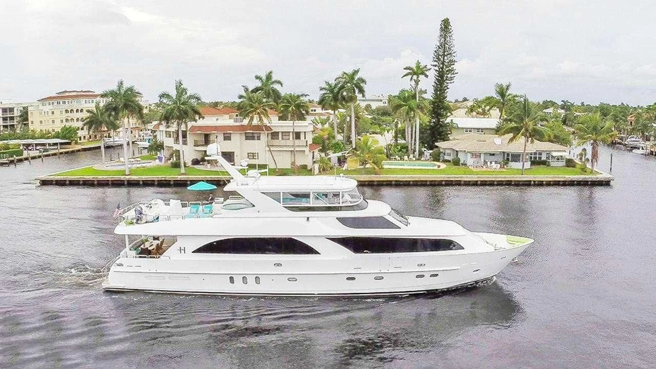 a white boat on the water aboard CYNDERELLA Yacht for Sale