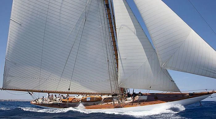 a large ship with a large sail aboard MARIQUITA Yacht for Sale
