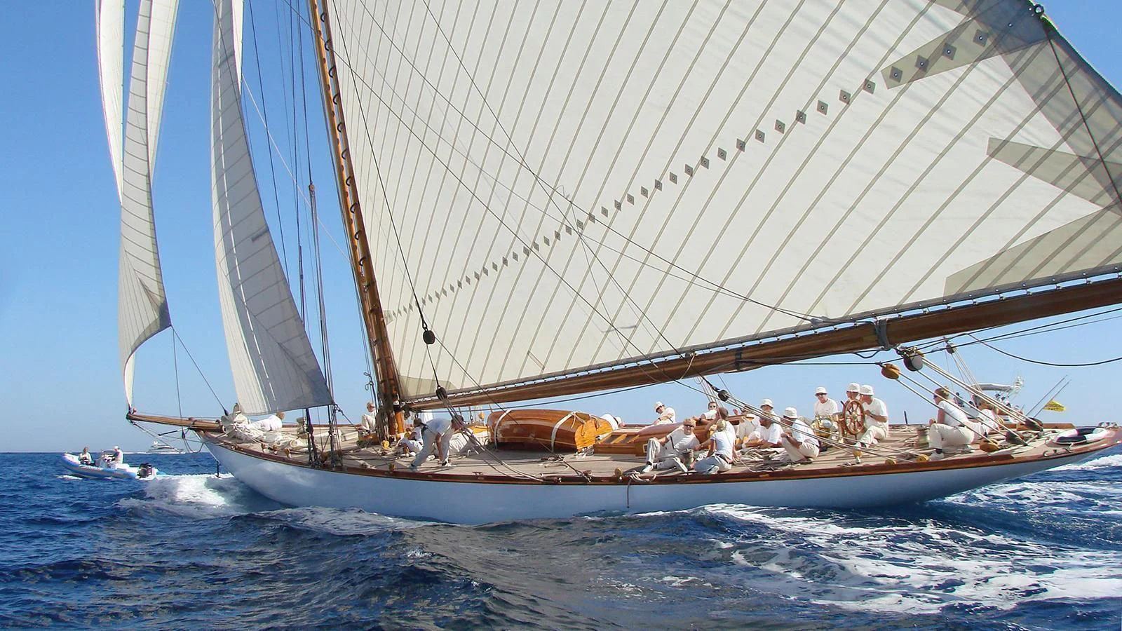 a sailboat with many people on it aboard MARIQUITA Yacht for Sale