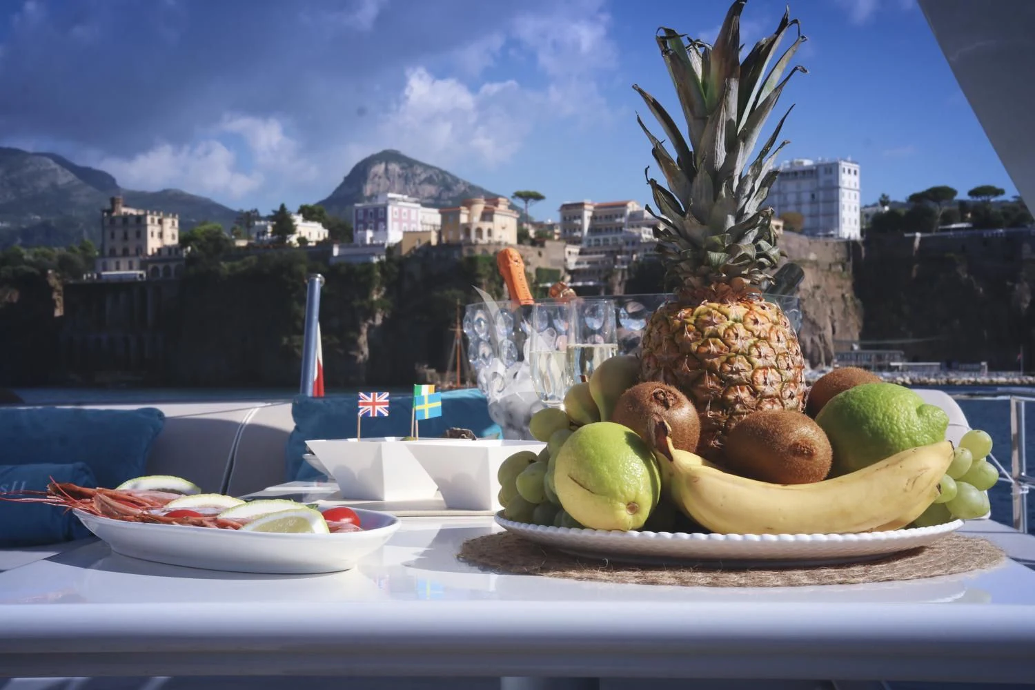 a pineapple on a table aboard RAMSES II Yacht for Sale