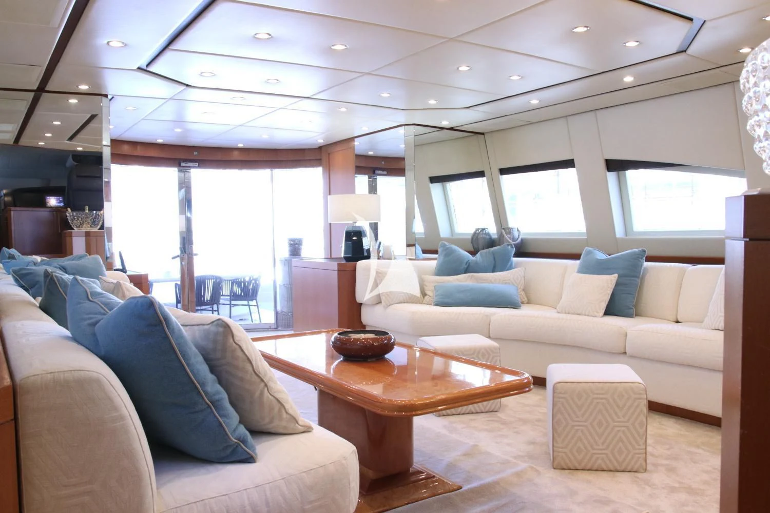 a living room with a couch and a coffee table aboard RAMSES II Yacht for Sale