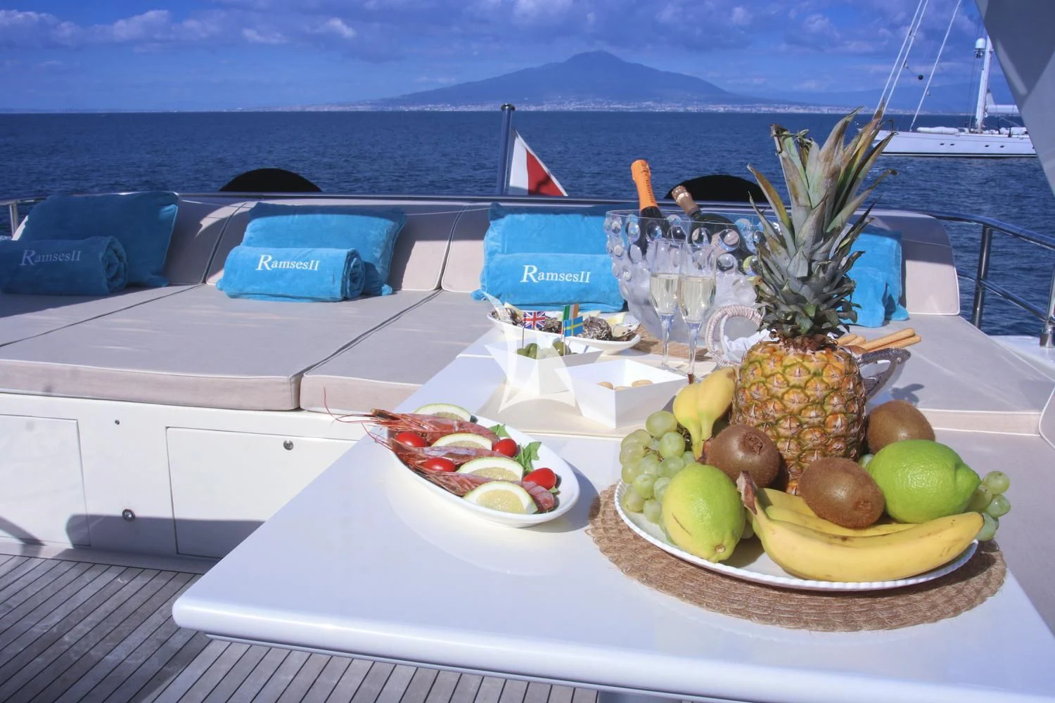 a table with food on it aboard RAMSES II Yacht for Sale